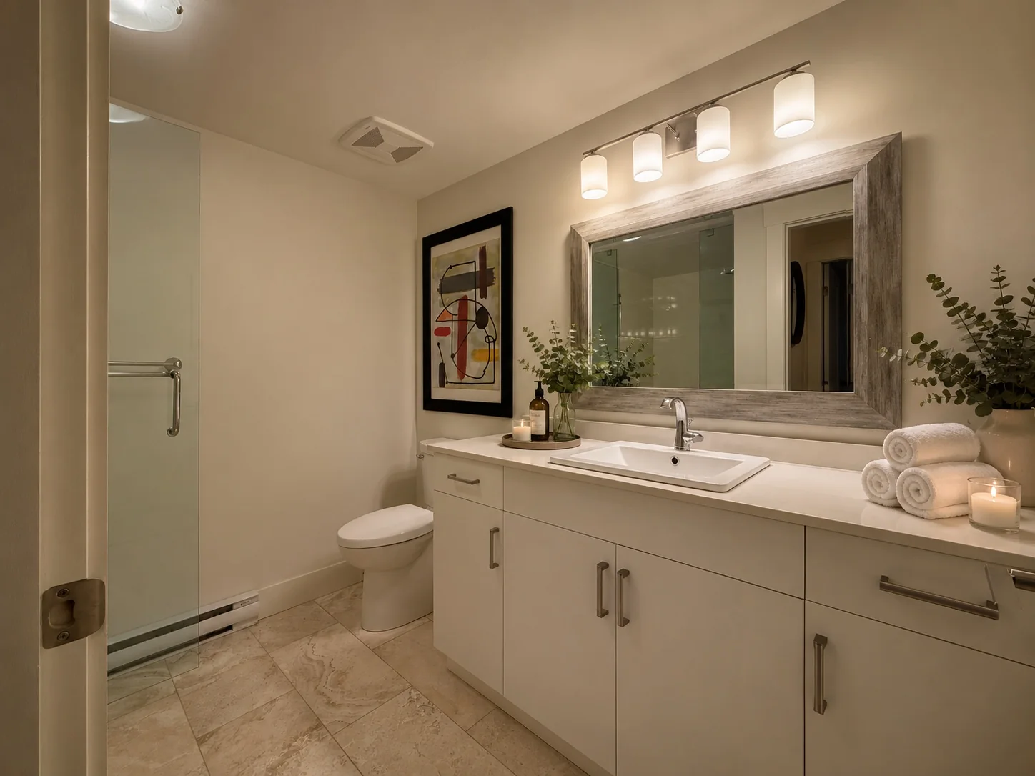Bathroom with towels and candle